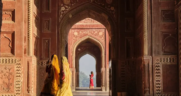 India woman in mosque of Taj Mahal