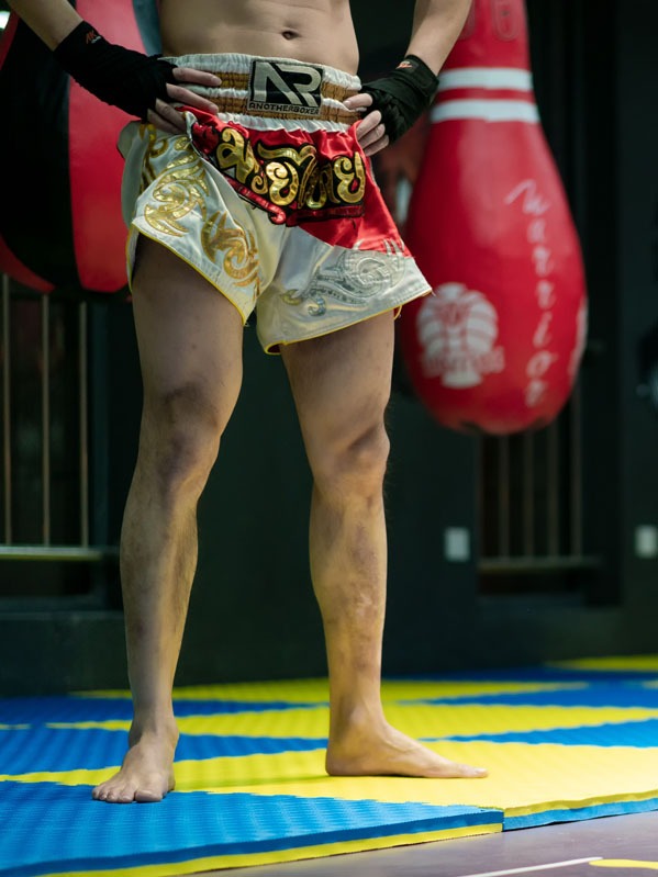 A Muay Thai, kick boxer waiting for his fight, Phuket , Thailand